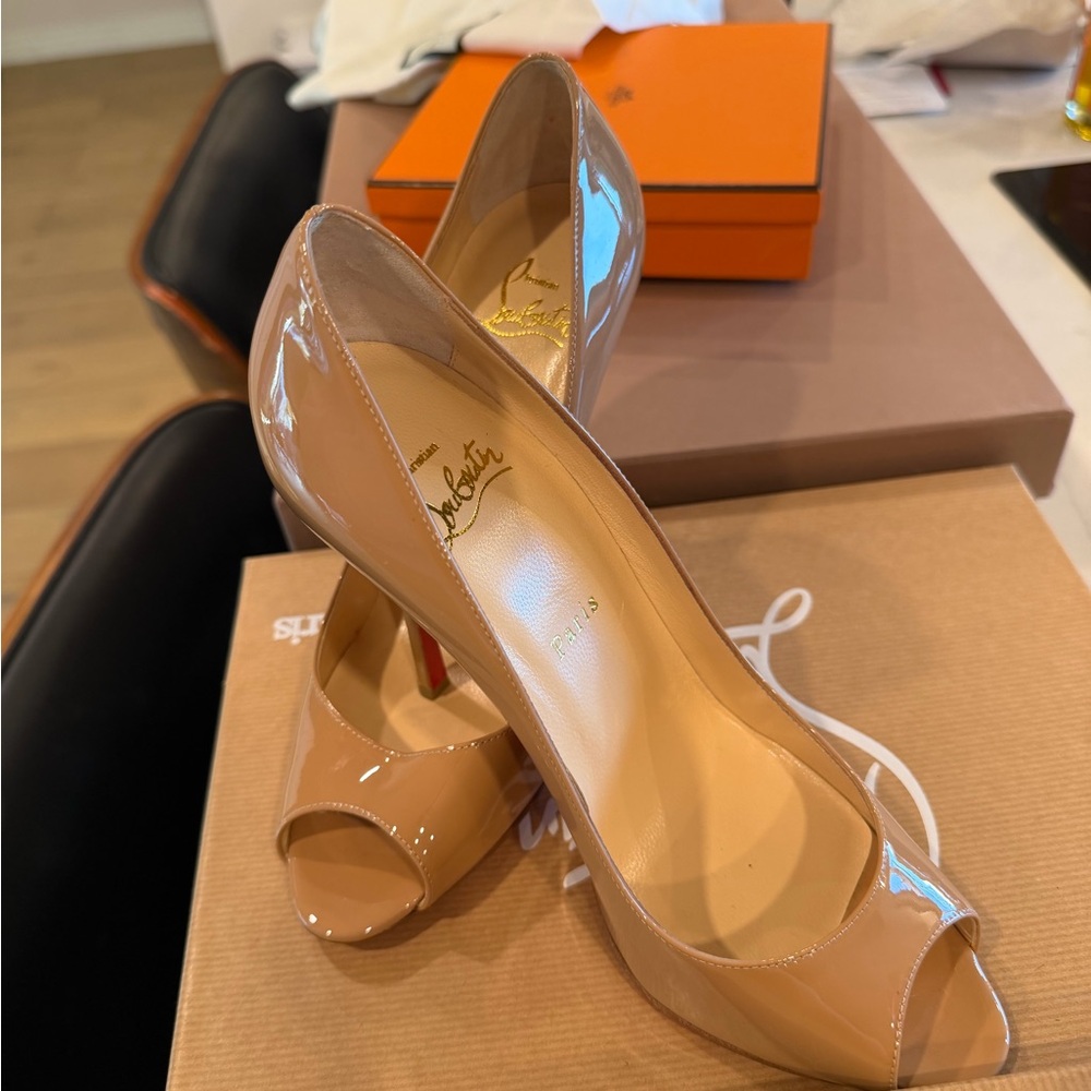 Christian Louboutin Nude Patent Pumps with Red Sole